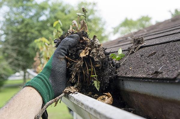 overflowing water, sagging gutters, and visible debris are clear indicators that it's time for gutter cleaning